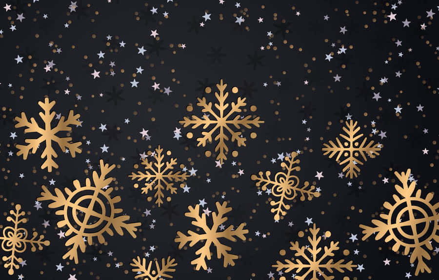 Gold Snowflakes On A Black Background Wallpaper