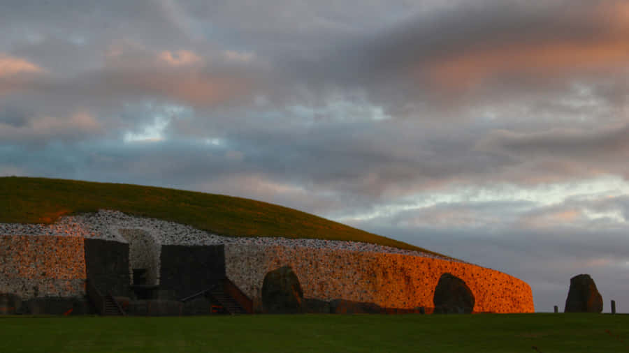 Golden Hours Newgrange With Clouds Wallpaper