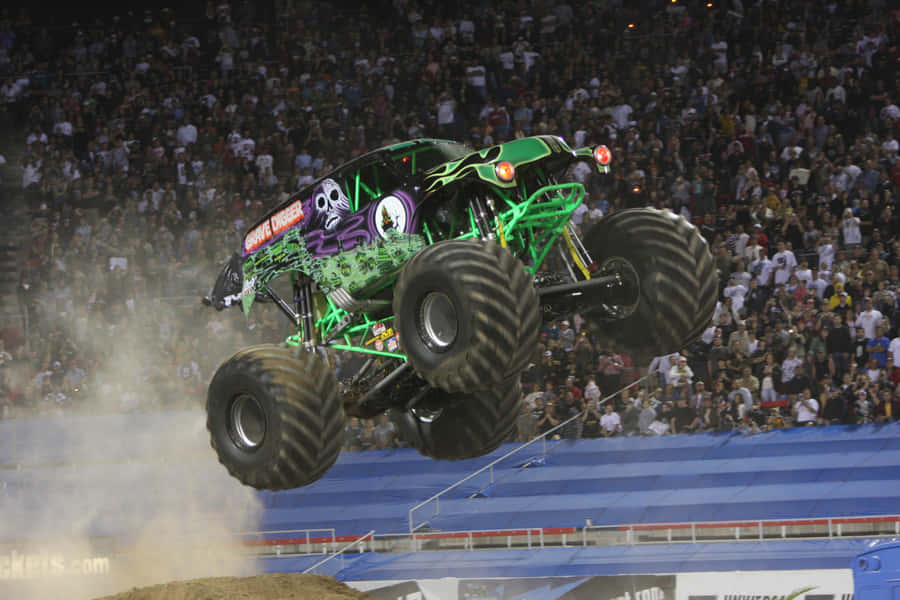 Grave Digger Monster Truck With Onlookers Wallpaper