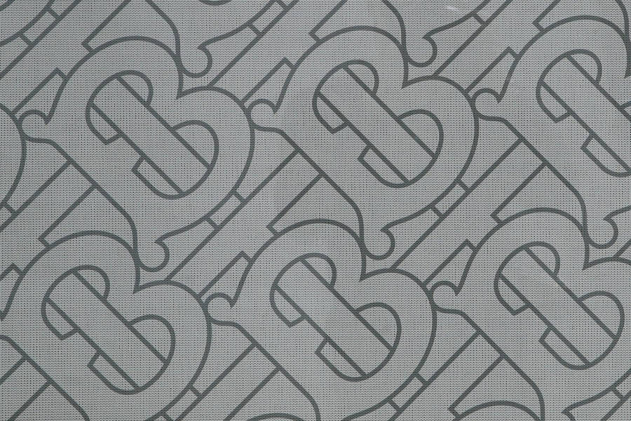 Gray Burberry Designer Logo Pattern Wallpaper