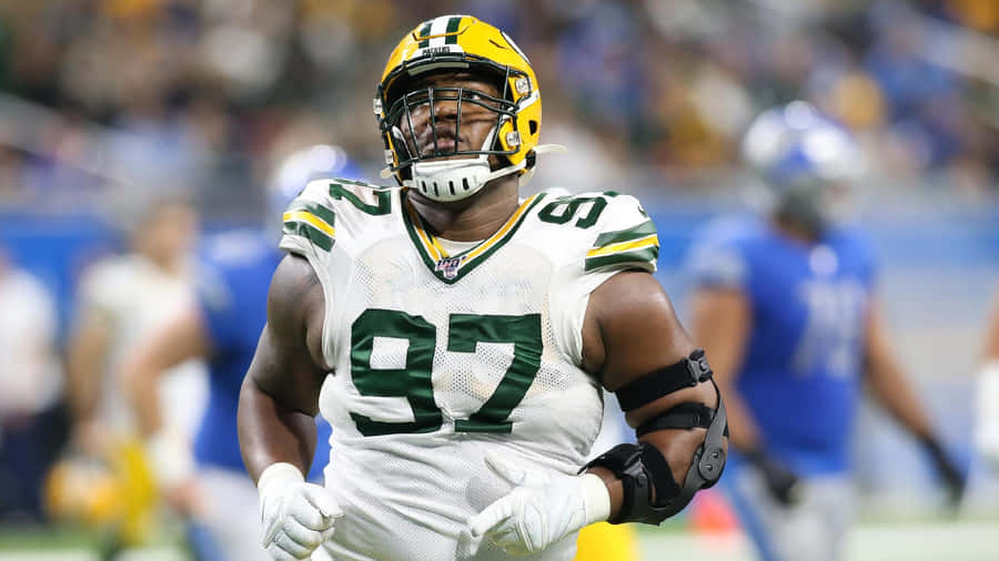 Green Bay Packers Kenny Clark In Ford Field Wallpaper