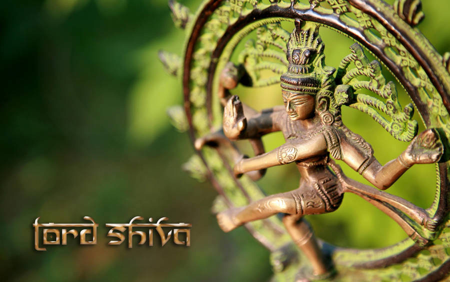 Green Metal Nataraja Figurine Wallpaper