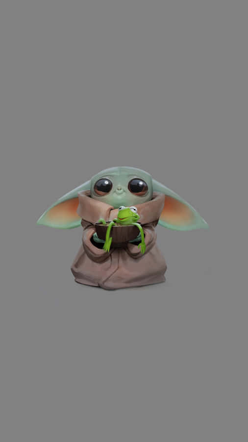 Grogu Holding Frog Wallpaper