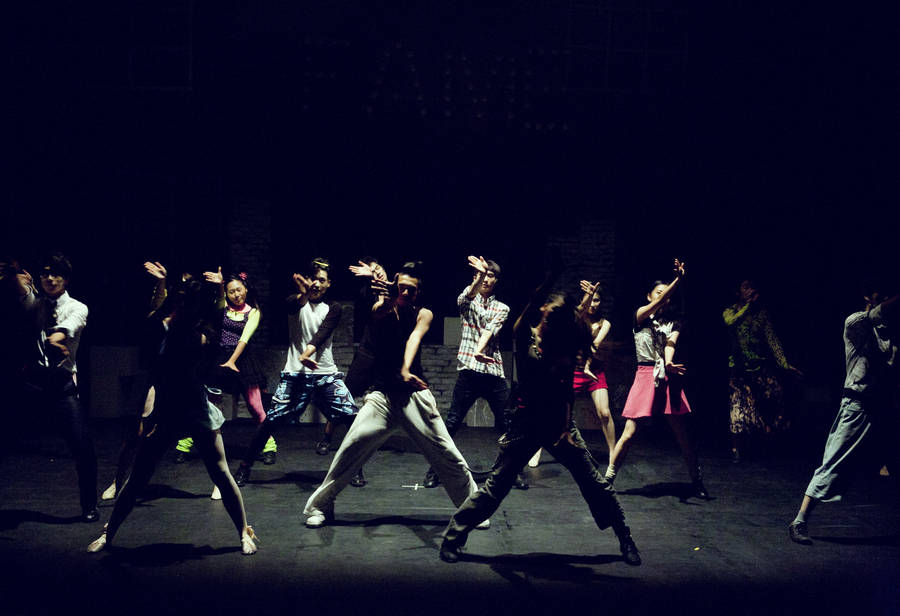 Group Of People Dancing Together Wallpaper
