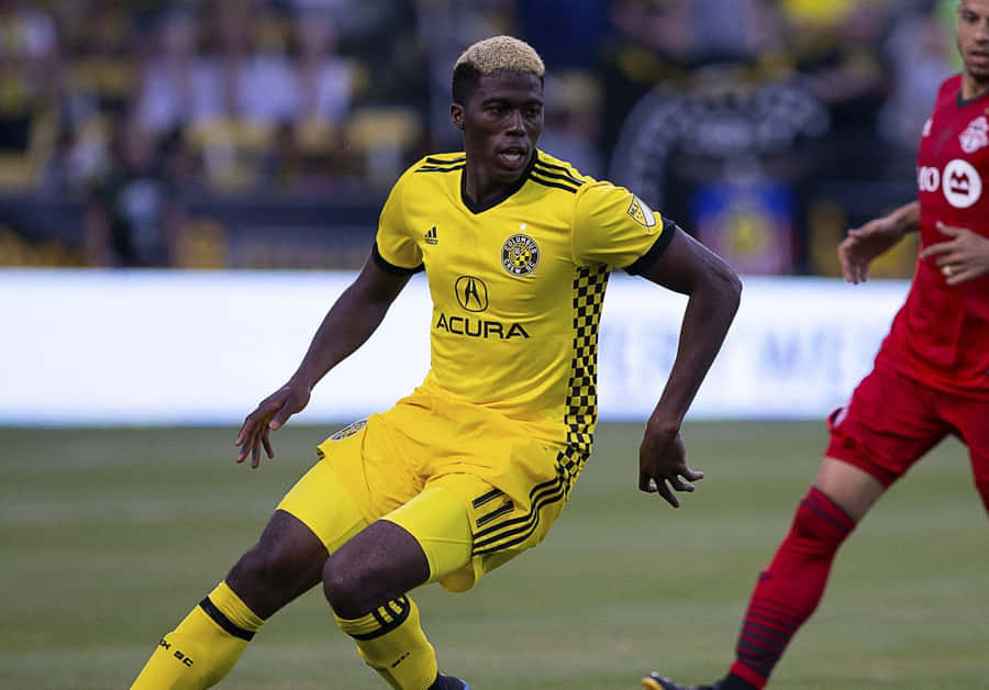 Gyasi Zardes Chases Ball With New York Red Bulls Wallpaper