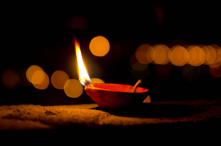 Happy Diwali Light On Red Bowl Wallpaper