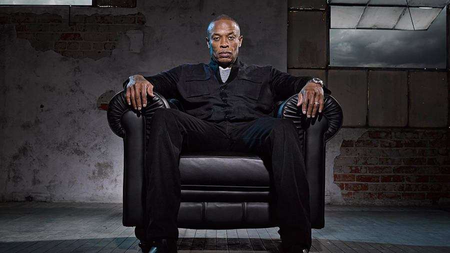 Hip-hop Artist On Couch Wallpaper