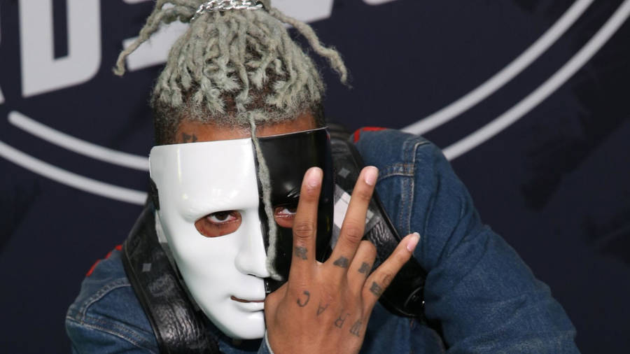 Iconic Poster Of Xxxtentacion In Blue Aesthetic Wallpaper
