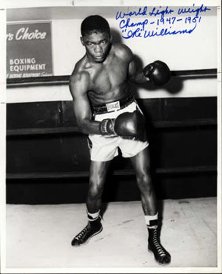 Ike Williams During A Championship Boxing Match Wallpaper