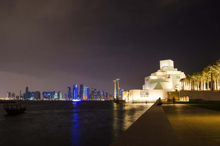Illuminated Museum Of Islamic Art At Night Wallpaper