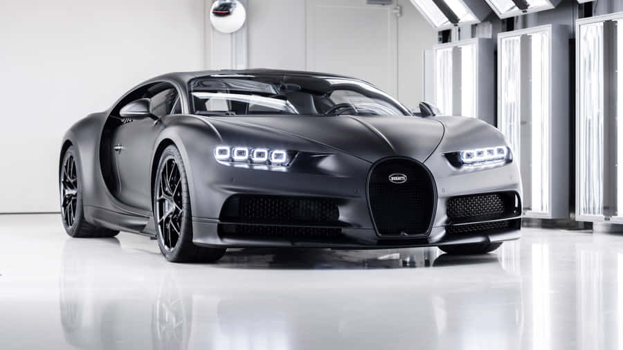 Illuminated Power - Experience Speed With Neon Bugatti Wallpaper