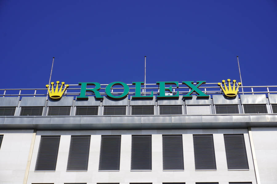 Impressive Rolex Logo On Building Facade Wallpaper
