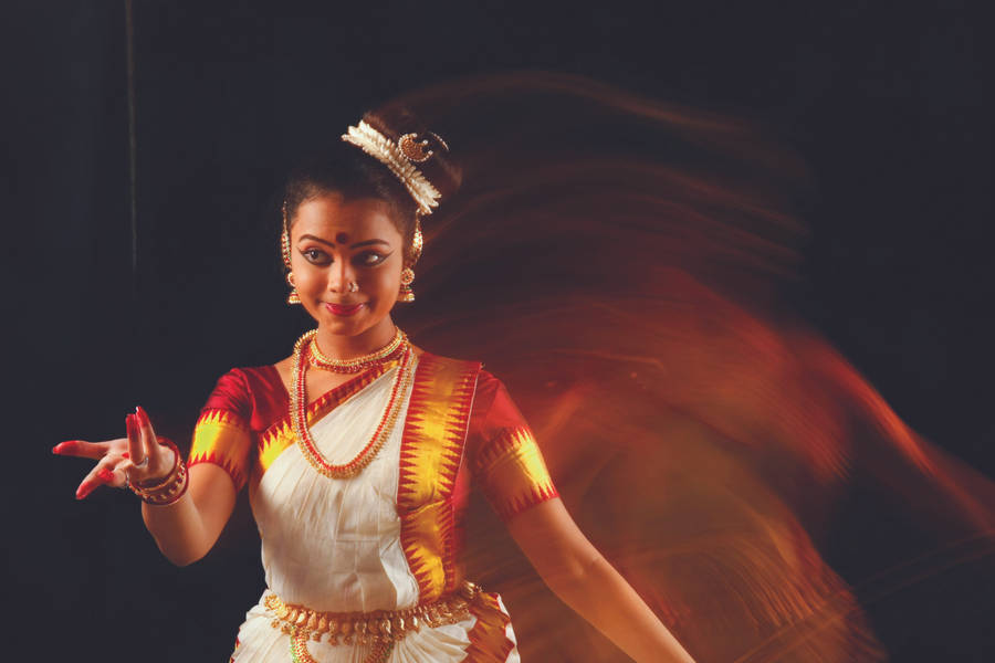 Indian Girl Finger Dance Pose Wallpaper