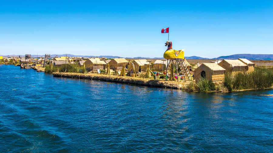 Indigenous Community Within The Breathtaking Environment Of Lake Titicaca. Wallpaper
