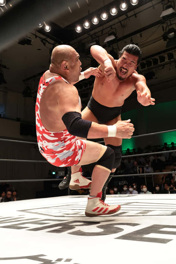 Intense Wrestling Match Action Wallpaper