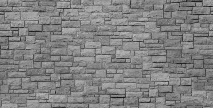 Intricate Small Stone Brick Wall Texture Wallpaper