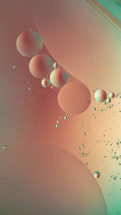 Iphone 12 Pro Max Pink Vibrant Bubbles Wallpaper