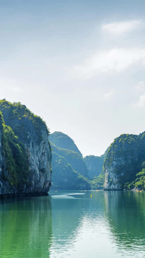 Islets Of Halong Bay And Green Water Wallpaper