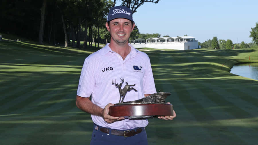 J.t. Poston Holding Deer Trophy Wallpaper