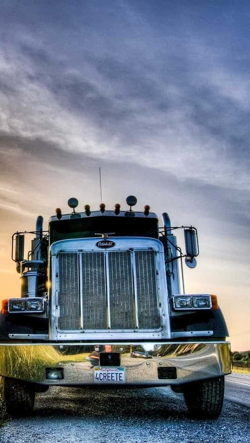 Jacked Up Trucks With Glossy Hood Covers Wallpaper