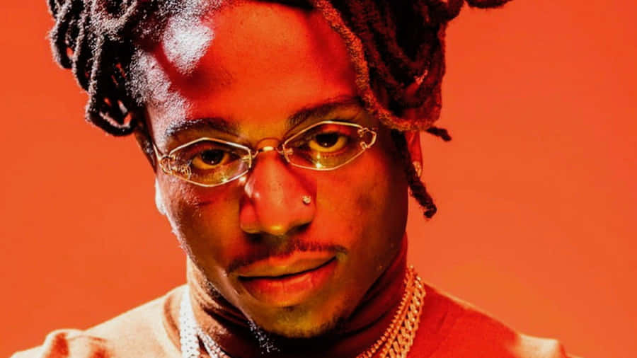 Jacquees Orange Photoshoot Wallpaper