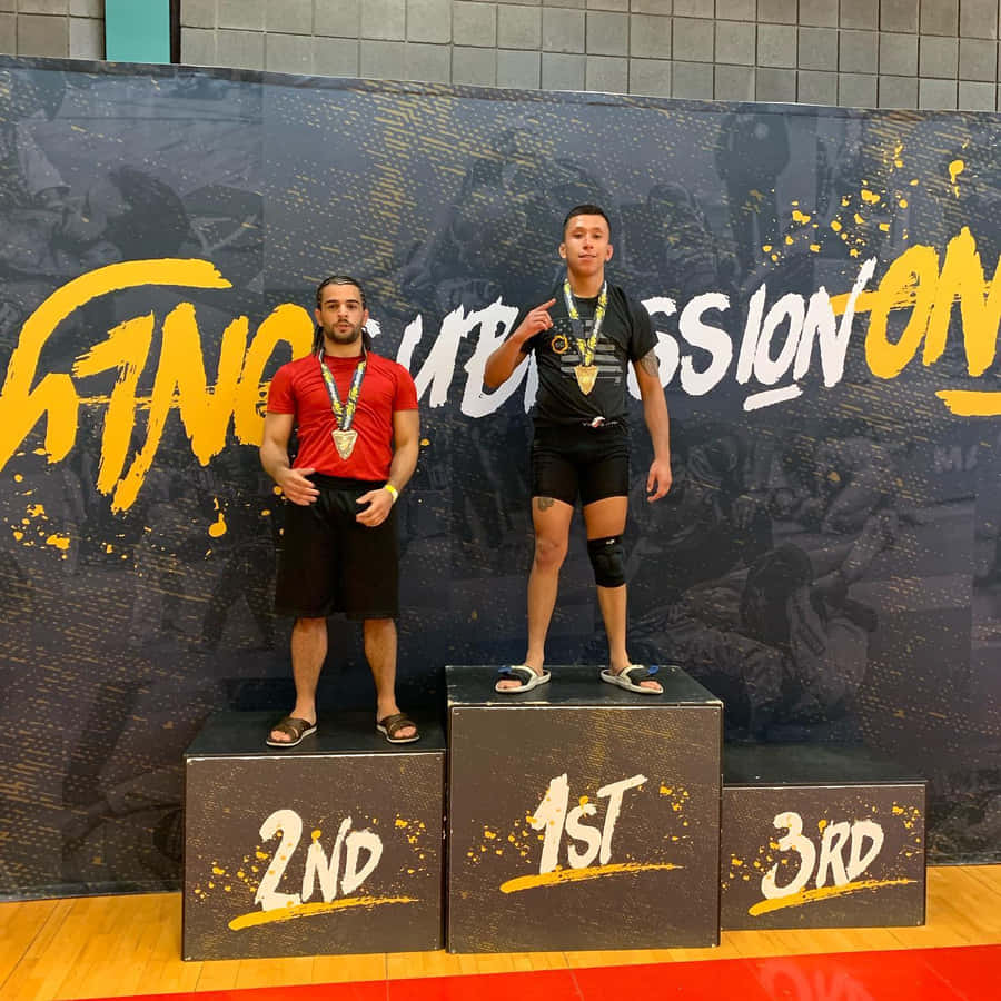 Jeff Molina Triumphantly Standing On The First-place Podium Wallpaper