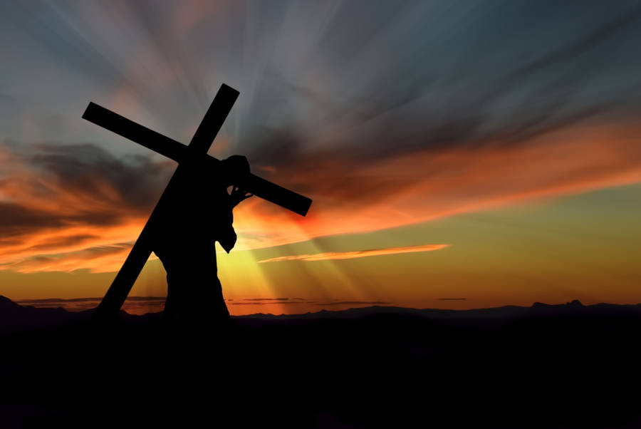 Jesus Cross Carried During Sunset Wallpaper