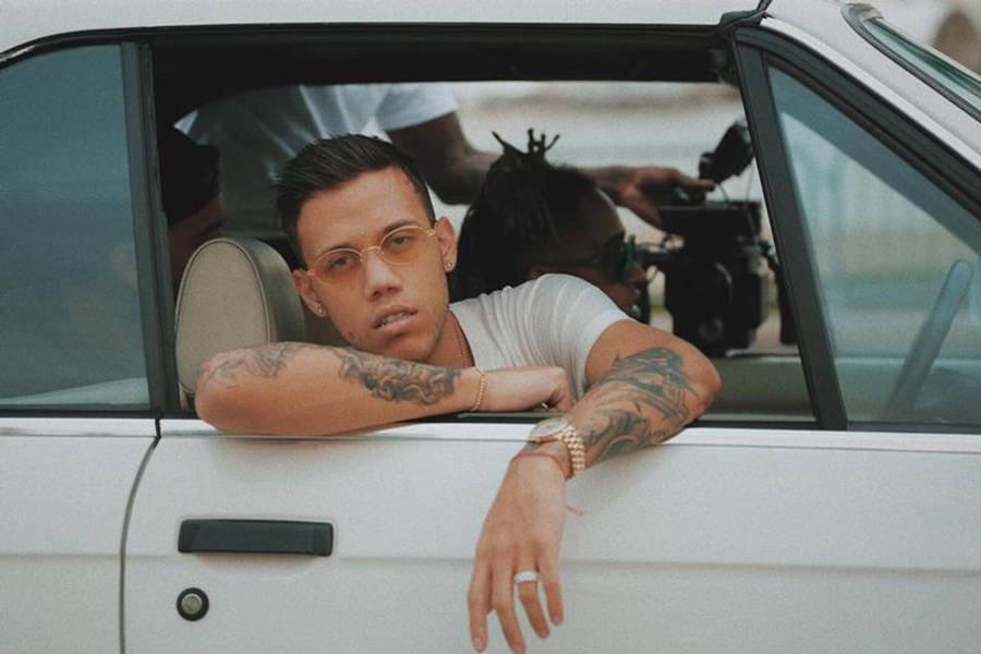 Jhay Cortez In Car Wallpaper