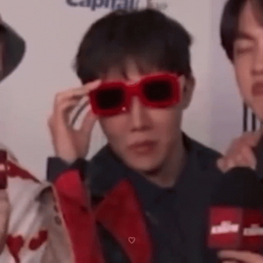 Jhope From Bts Exuding Radiance And Charm Wallpaper