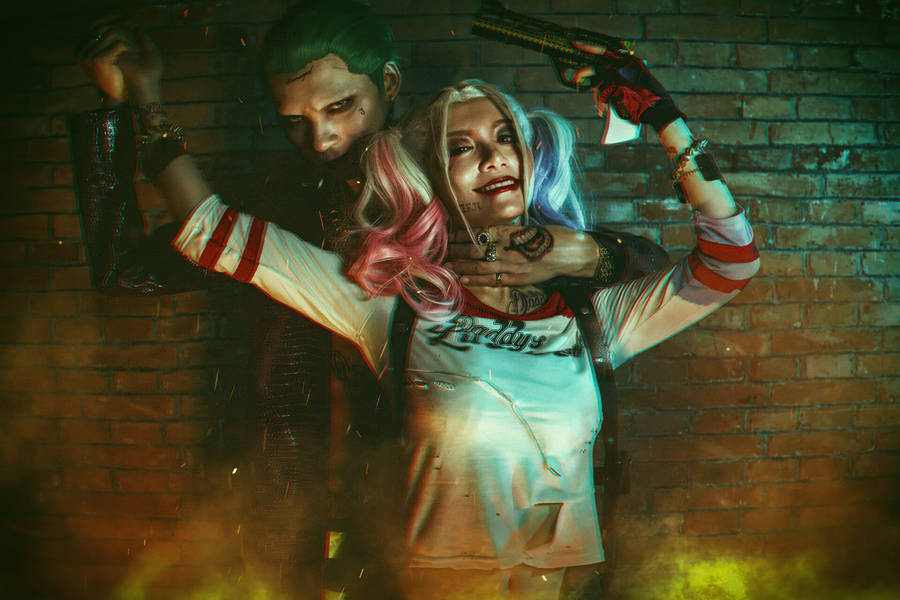 Joker And Harley Quinn Fiery Cosplay Wallpaper