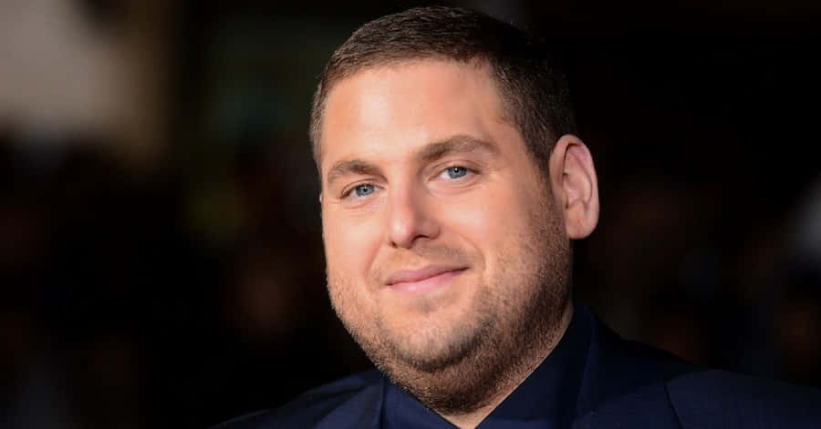 Jonah Hill Sharing A Smile Wallpaper