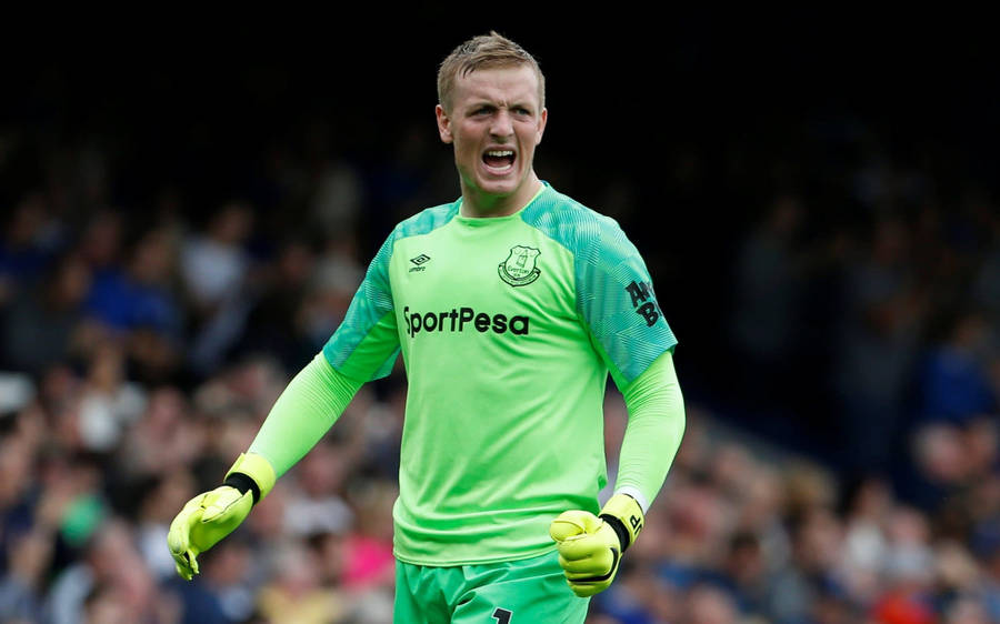 Jordan Pickford In Neon Green Jersey Wallpaper