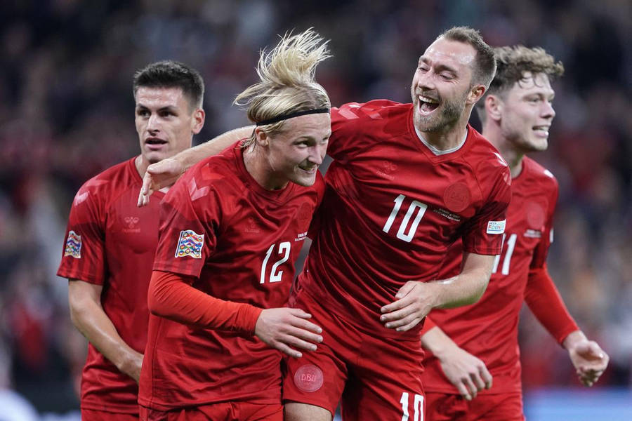 Joyful Denmark National Football Team Players Wallpaper