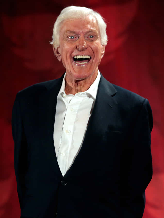 Joyful Senior Manin Black Suit Wallpaper