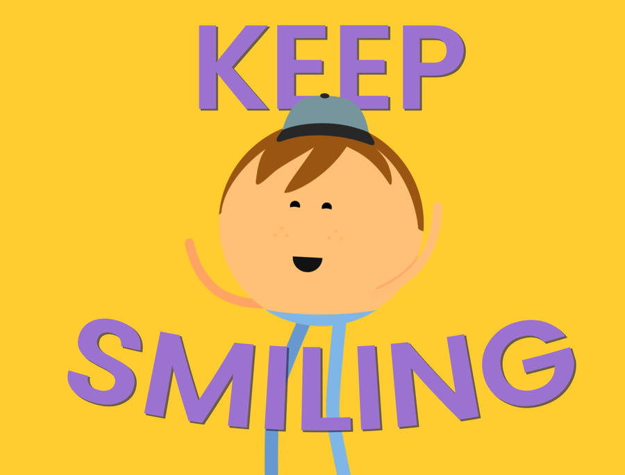 Joyful Young Boy With A Radiant Smile Wallpaper