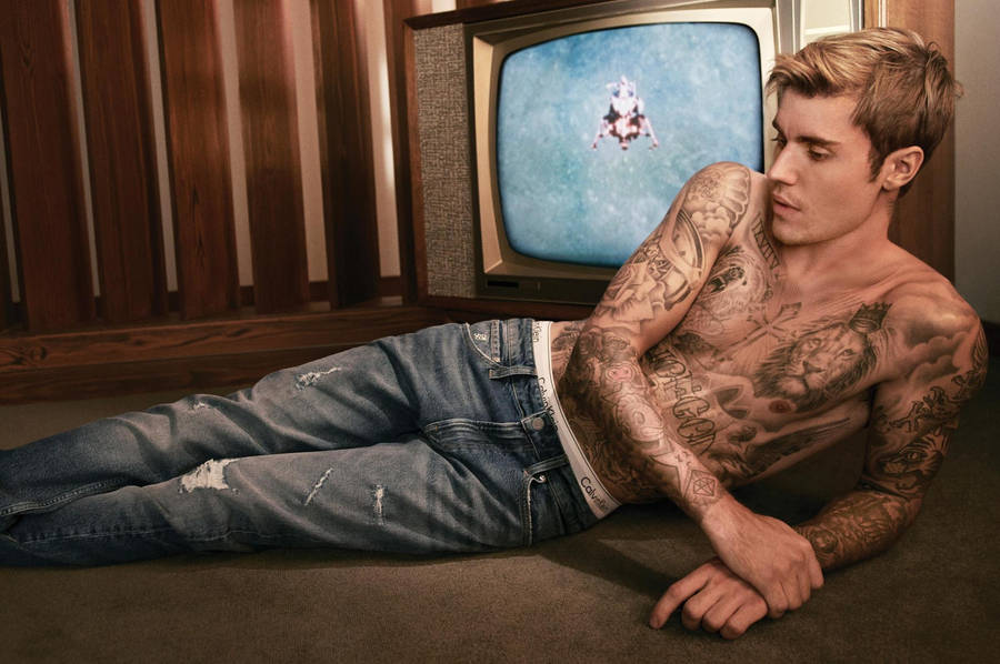 Justin Bieber Strikes A Vintage Pose Wallpaper
