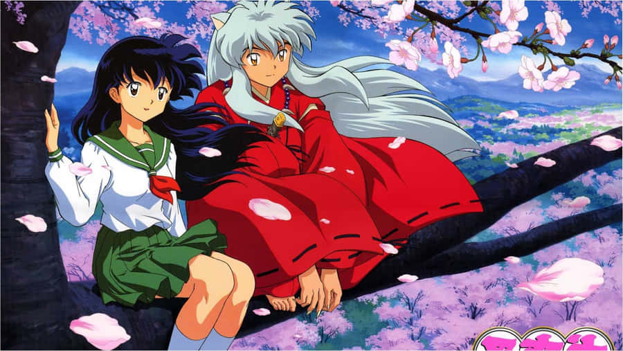 Kagome And Inuyasha Together Amidst Breathtaking Mountain Scenery. Wallpaper