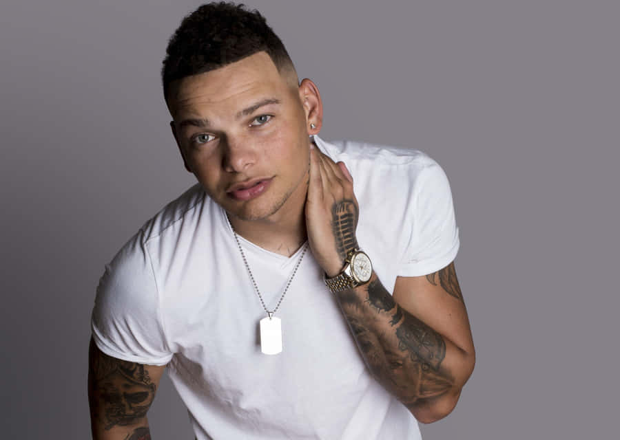 Kane Brown Posing Gray Background Wallpaper