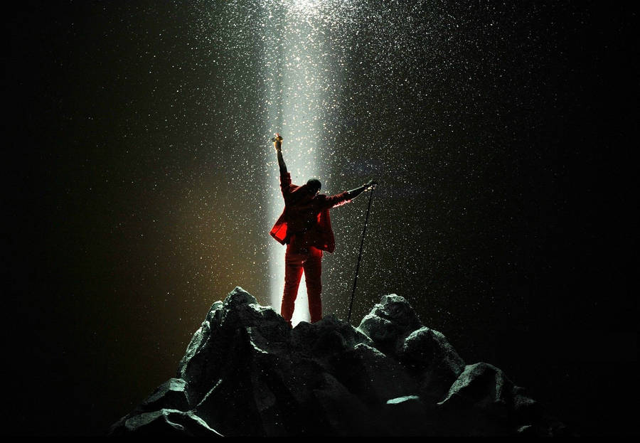 Kanye West Bright Lights On Rocks Wallpaper