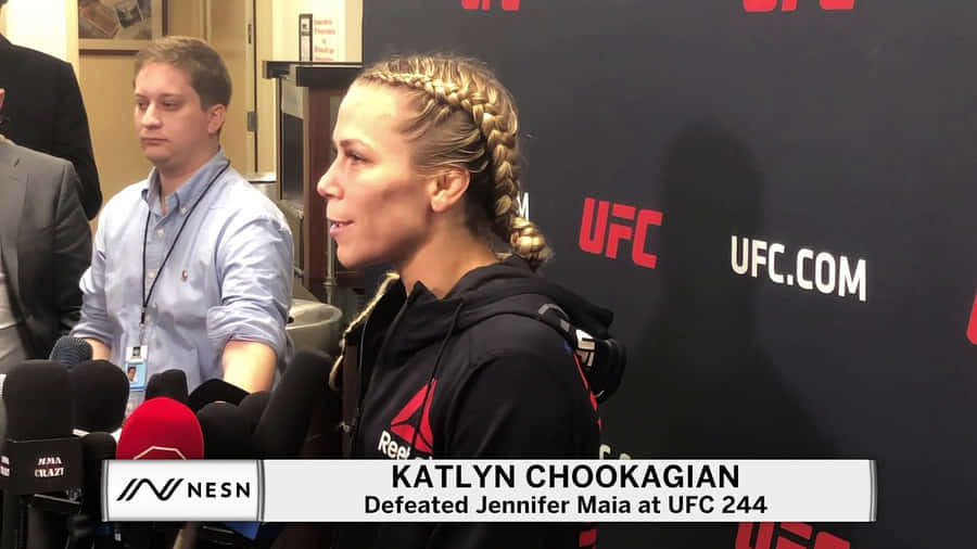 Katlyn Chookagian Being Interviewed Wallpaper