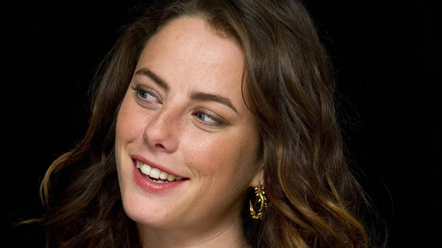 Kaya Scodelario At Her Side Wallpaper