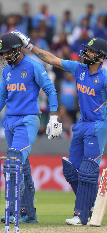 Kl Rahul Patting Ms Dhoni Wallpaper
