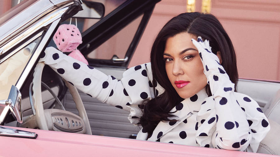 Kourtney Kardashian In Pink Car Wallpaper
