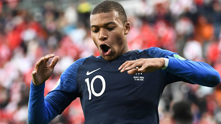 Kylian Mbappe Mouth Wide Open Wallpaper