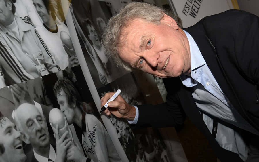 Legendary Goalkeeper Sepp Maier At World Champions Party Wallpaper