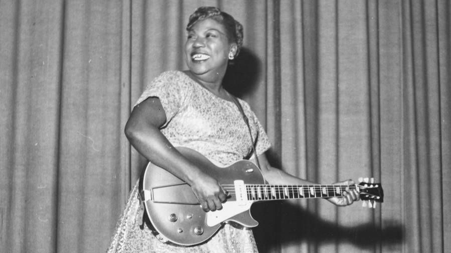 Legendary Sister Rosetta Tharpe Joyfully Singing Wallpaper