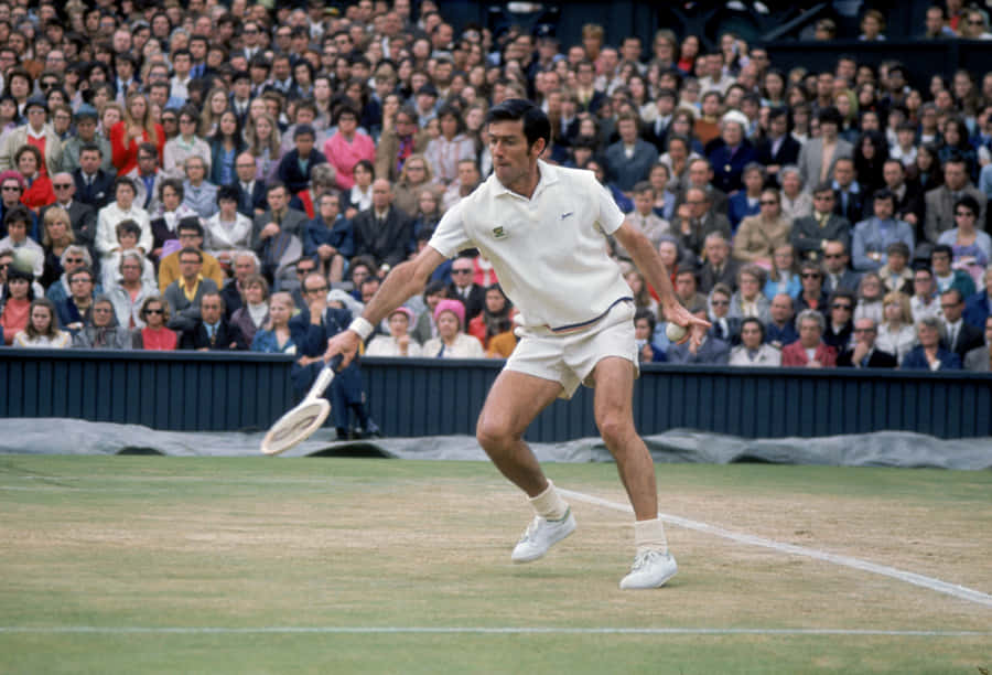 Legendary Tennis Athlete, Ken Rosewall In Action Wallpaper