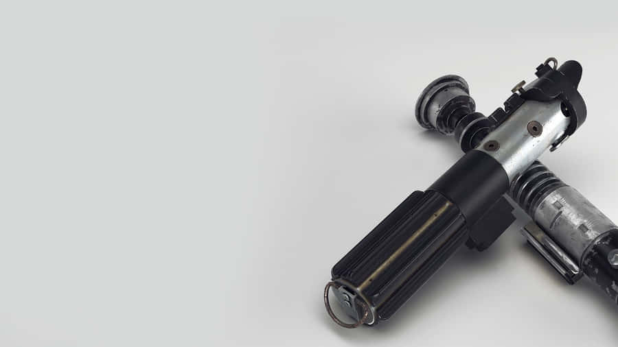 Lightsabers Crossed In Epic Star Wars Lightsaber Duel Wallpaper