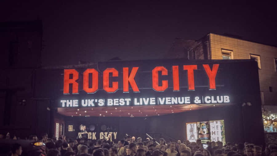 Lil Pump Poses In A Multi Coloured Outfit Wallpaper