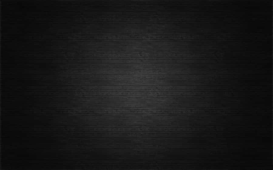 Luxuriously Glossy Black Surface Resembling Polished Marble. Wallpaper